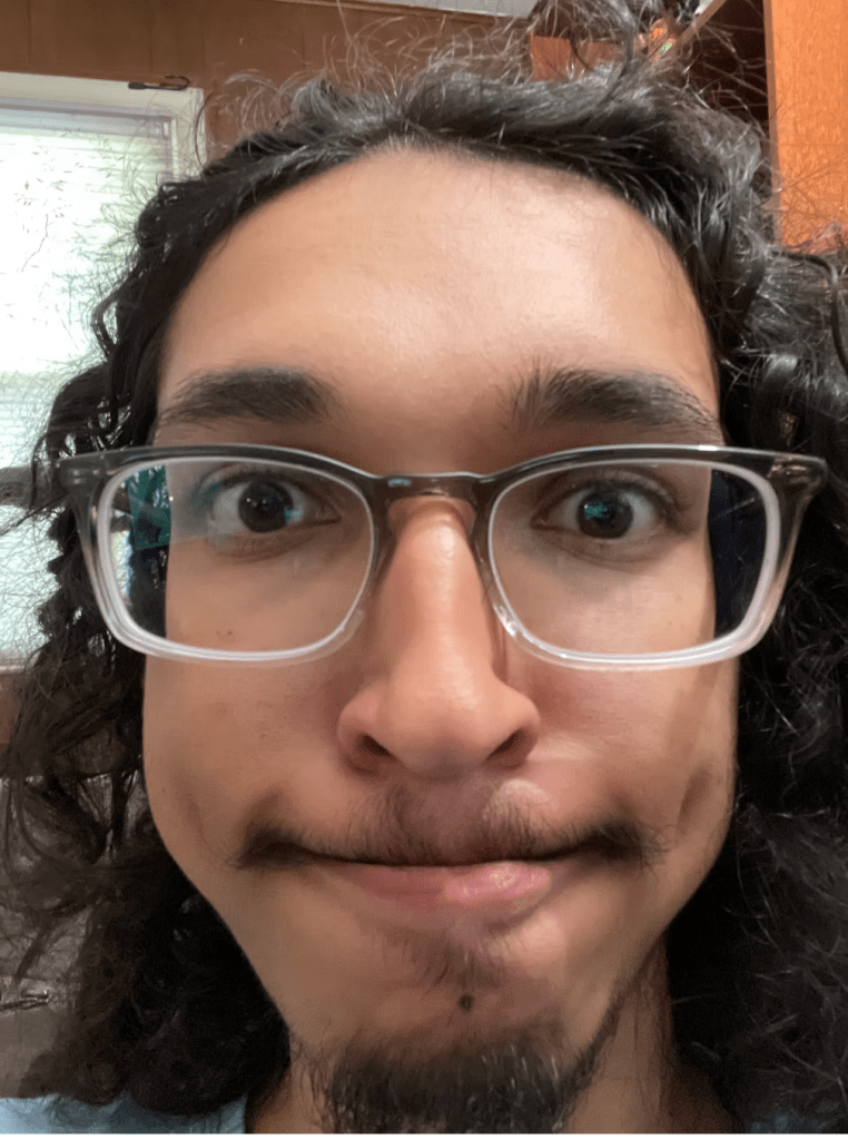 Darwin LaPollo mugs for teh camera